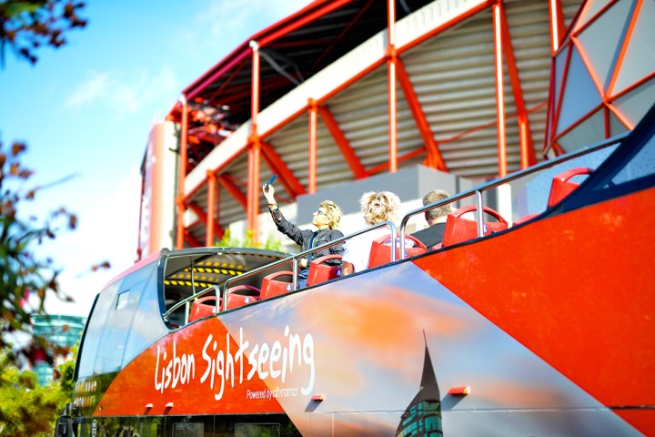 a large air plane on an orange umbrella