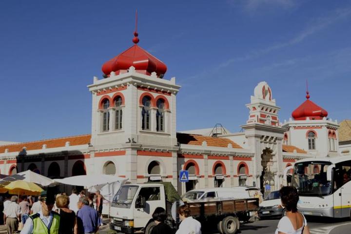 a group of people standing in front of a building