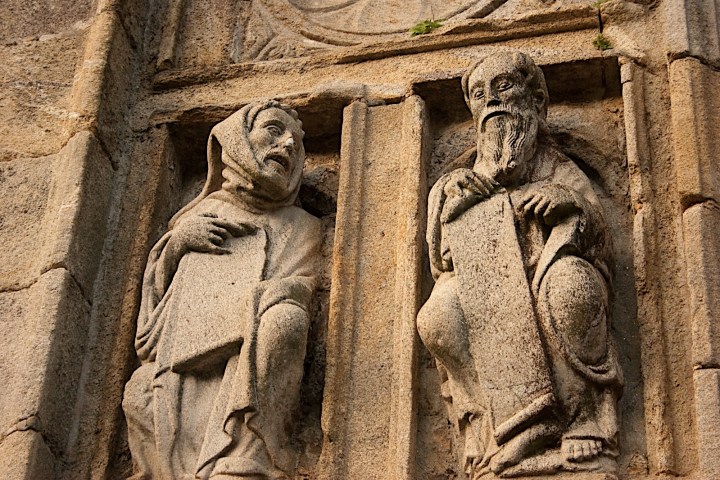 a stone statue of a person