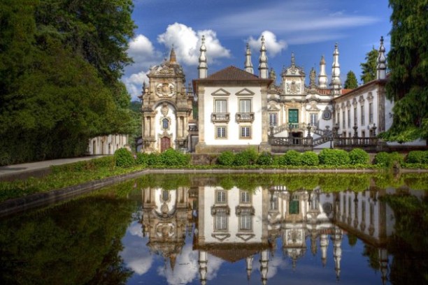 a castle on a bridge over a body of water