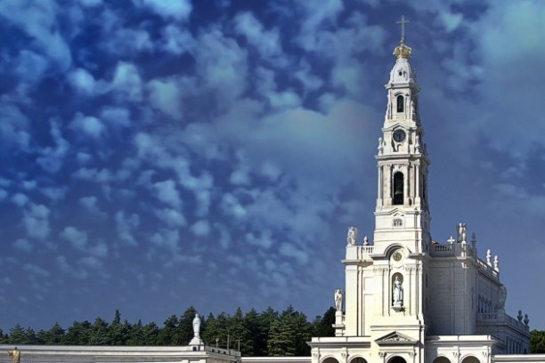 a large clock tower in front of a building