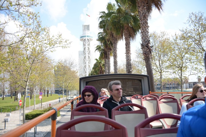 a group of people sitting at a park