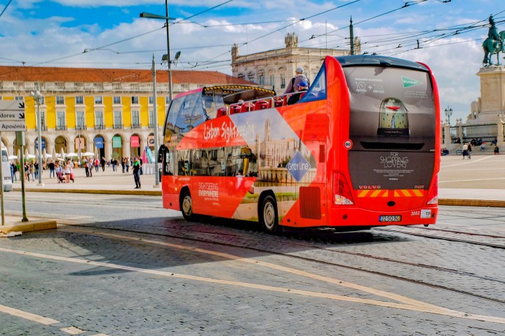 a train is parked on the side of a road