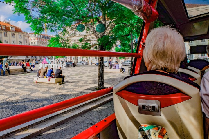 a group of people riding on the back of a boat