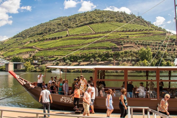 a group of people standing on top of a mountain