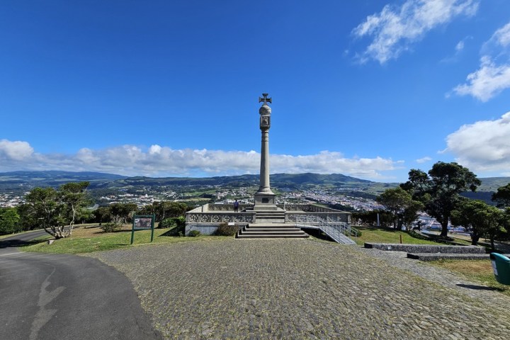 a sign on the side of a road