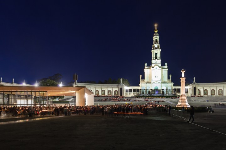 a clock tower lit up at night
