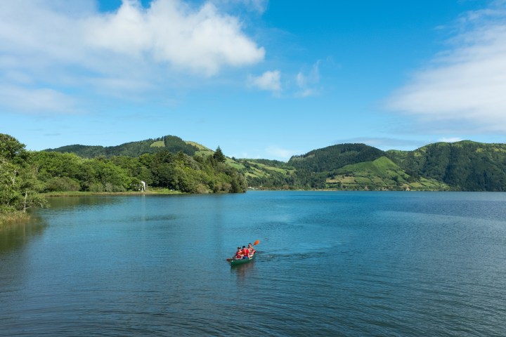 a small boat in a body of water