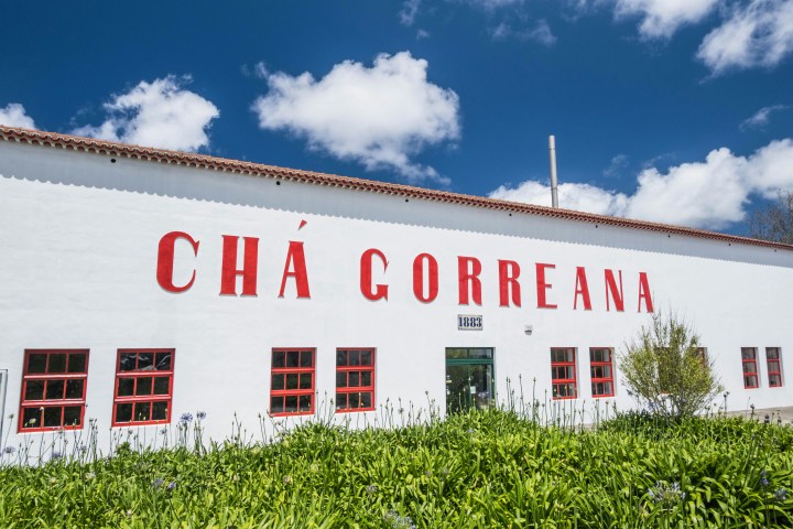 a sign in front of a building